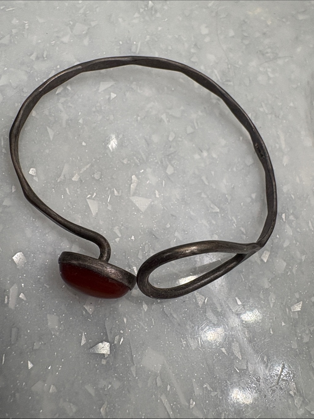 Handcrafted Silver-Tone Cuff with Red Stone Accent